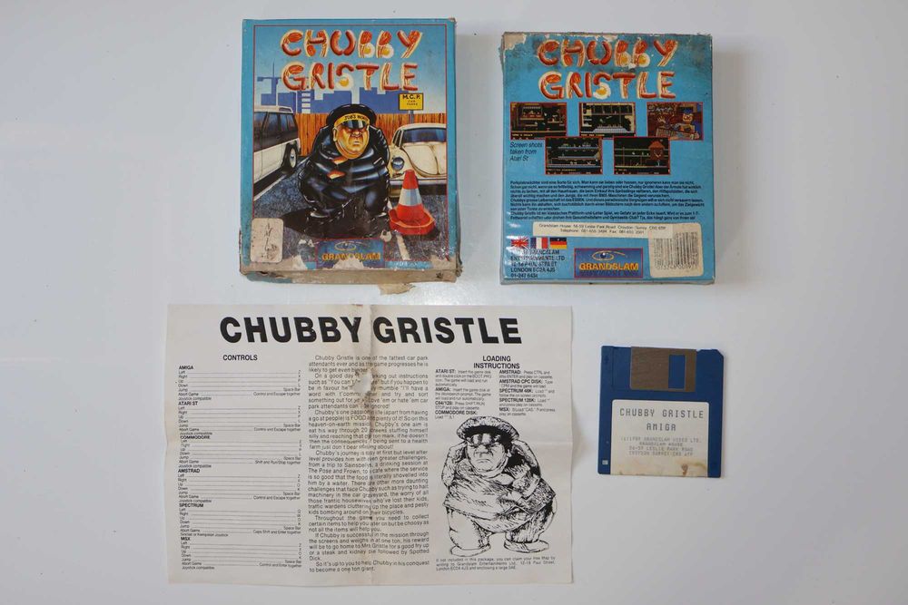 Gra Chubby Gristle wydawca Grandslam na Komputery Retro Commodore Amiga 500 600 1200 Atari ST IBM Disc 3,5" 1989 Ang Big Box Komplet Stan Dostateczny