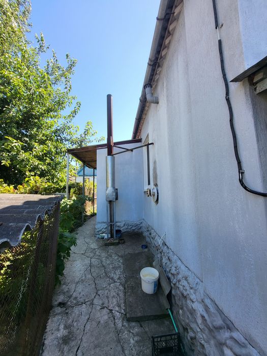 Продам уютный дом с двумя видами отопления.