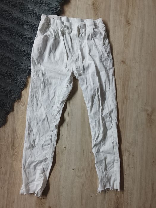 Nowe gniecione jeansy białe tanio