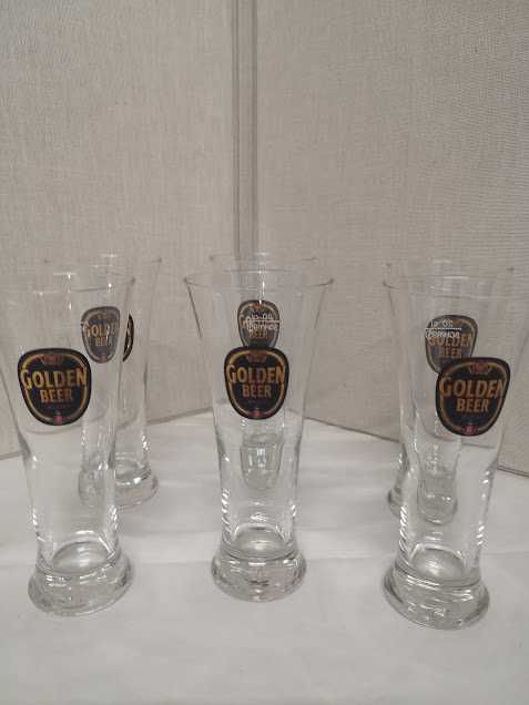 Copos de cerveja antigos da Golden Beer