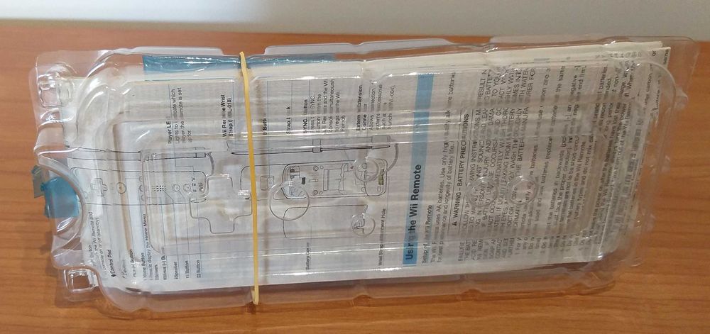 2 Caixas Mario Kart + Volante original - Manuais wiimote