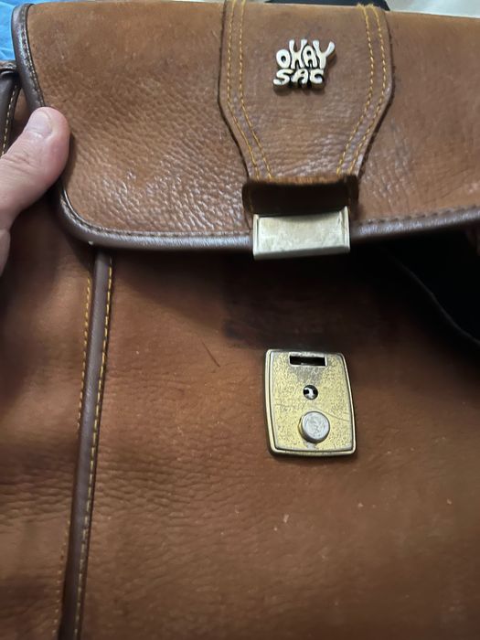 Mala de pele unisexo usada