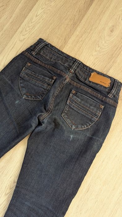 Damskie spodnie jeansowe Orsay 36