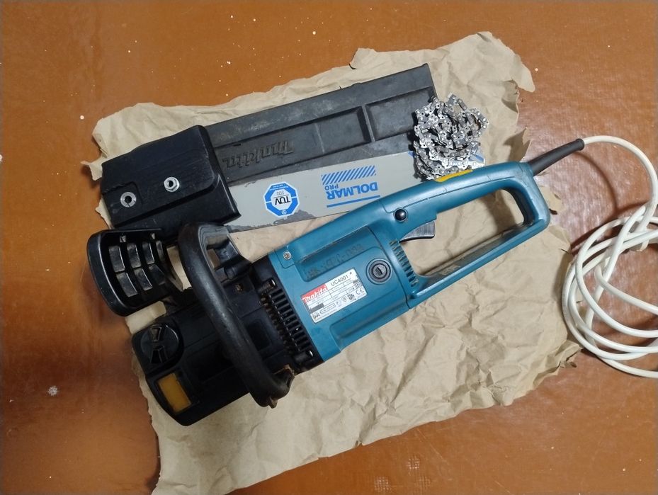 Электропила Makita UC4001