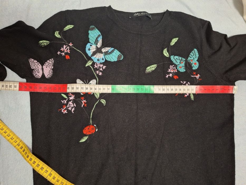 Czarny sweterek damsko dziewczęcy