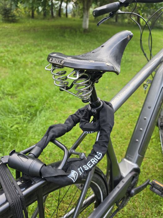 Elekrtyczny TREK District+ 7 – Bosch Active Line Plus 500 Wh – pasek – 2023 – Brooks B135 - Ładowarka Bosch