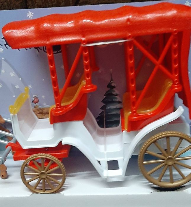 Музична іграшка.
Різдвяна карета з оленями.