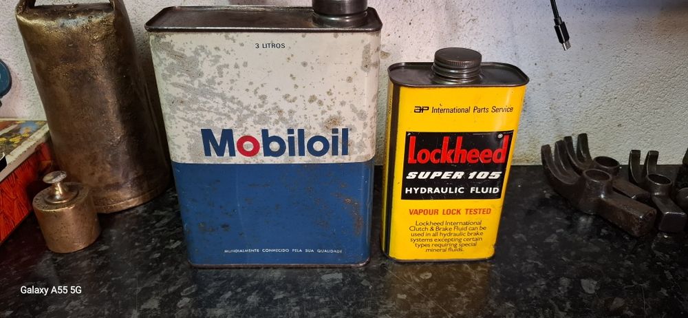 Latas antigas de lubrificantes
