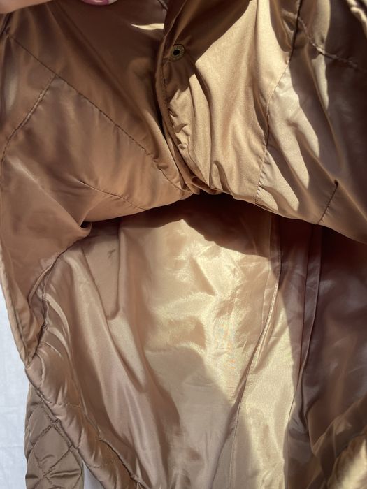 жіноча легка куртка стьобана