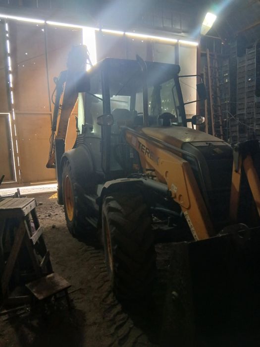 Экскаватор погрузчик  TEREX 860