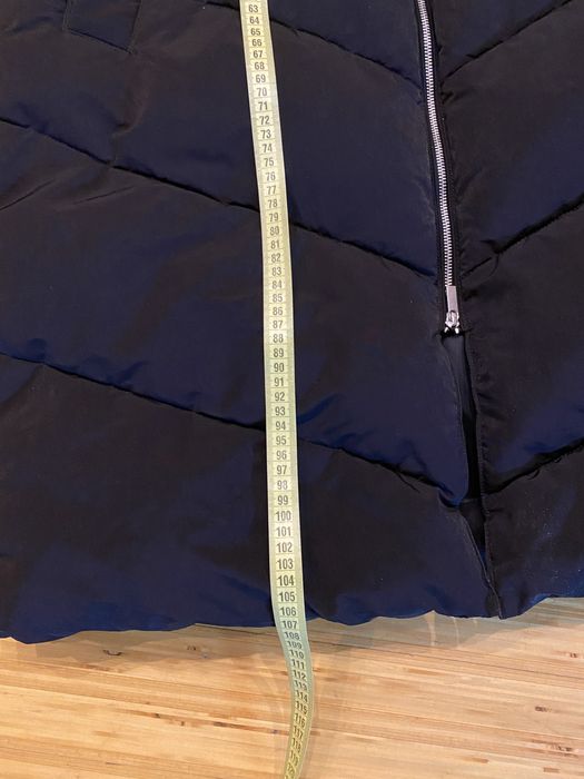 Жіноча жилетка