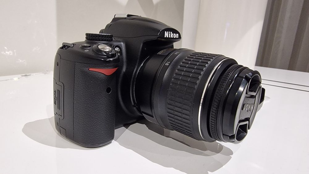 Nikon D5000 + Lente 18-55mm  + extras