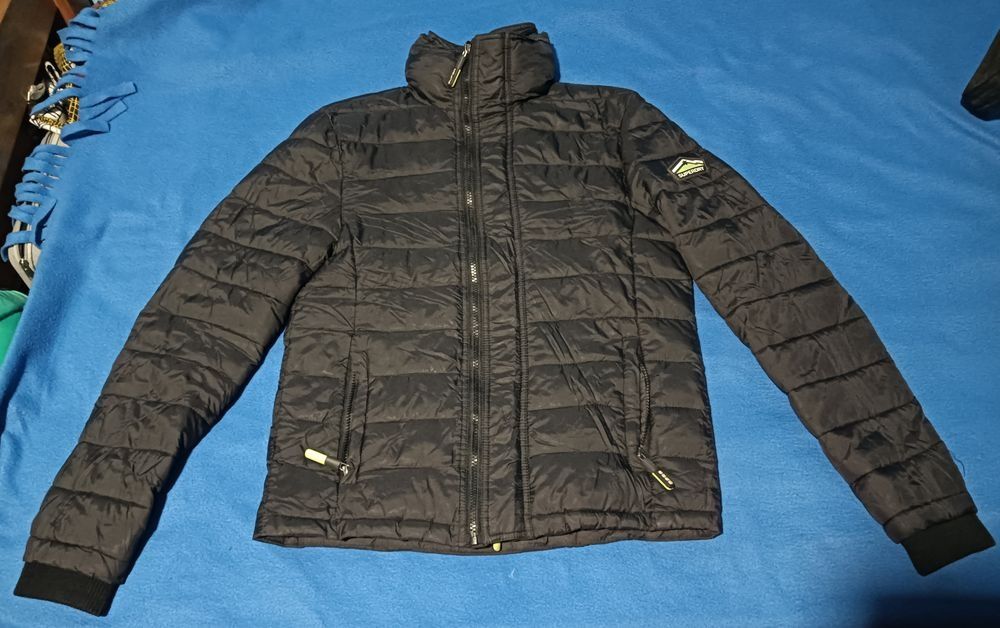 Blusão quente em bom estado com bolsas com fecho64741029445763120