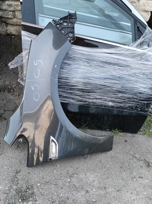 крило переднє  Opel Astra J 13302208  13302207