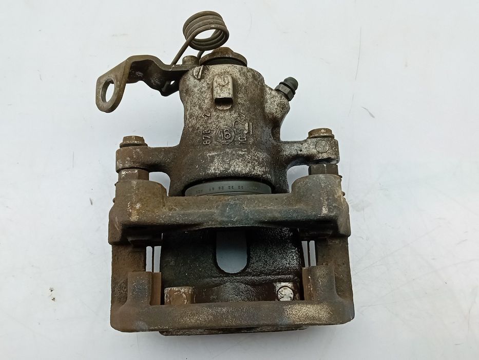 Pinça travão / maxila de travão trás esquerda OPEL Astra H Hatchback (