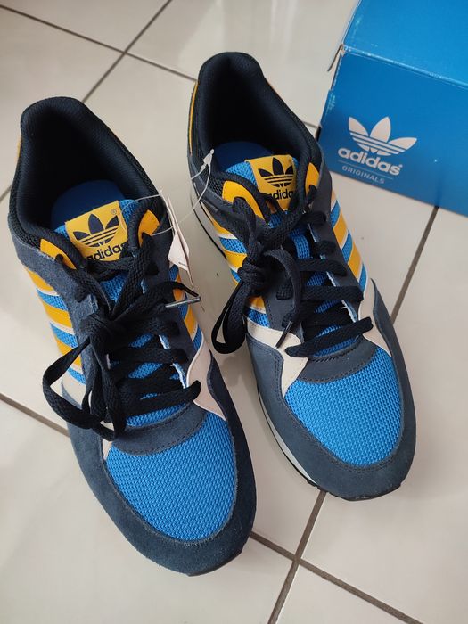 Оригінальні синьо-жовті кросівки Adidas ZX100 р.43 (устілка 28,5см.)