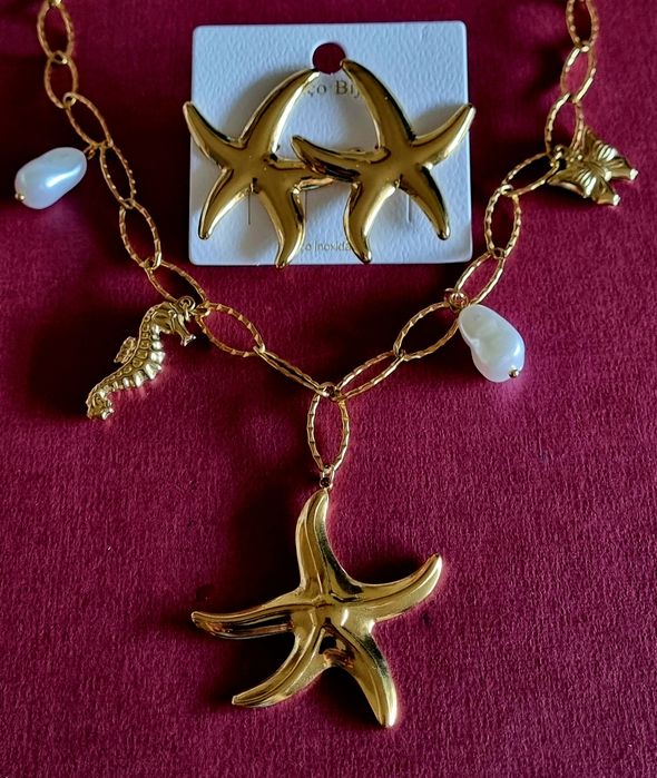 Conjunto dourado (colar e brincos), em aço, da estrela do mar
