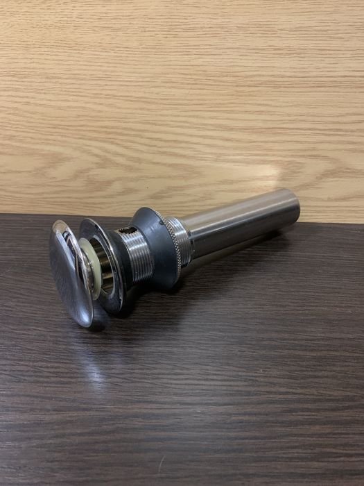 Аксессуары для ванной комнаты: донный клапан и смеситель TUNY