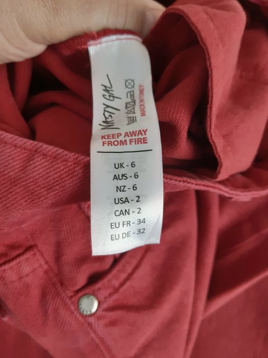 Джинси широкі червоні 42-44 р.