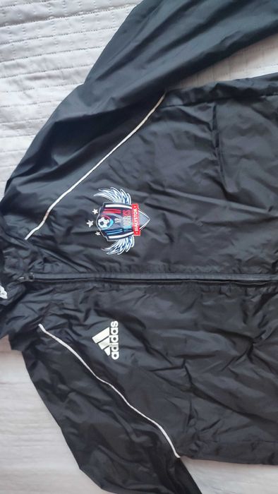 Sprzedam kurtkę przeciwdeszczową Progres Białystok 158-164