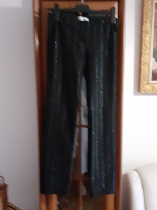 Spodnie damskie czarne ze srebrnymi nitkami