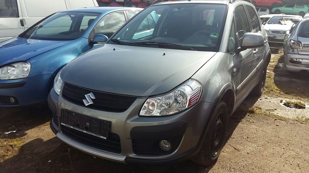 Na części Suzuki SX4 ZCD Silnik Skrzynia Maska Zderzak Drzwi Klapa Szyba