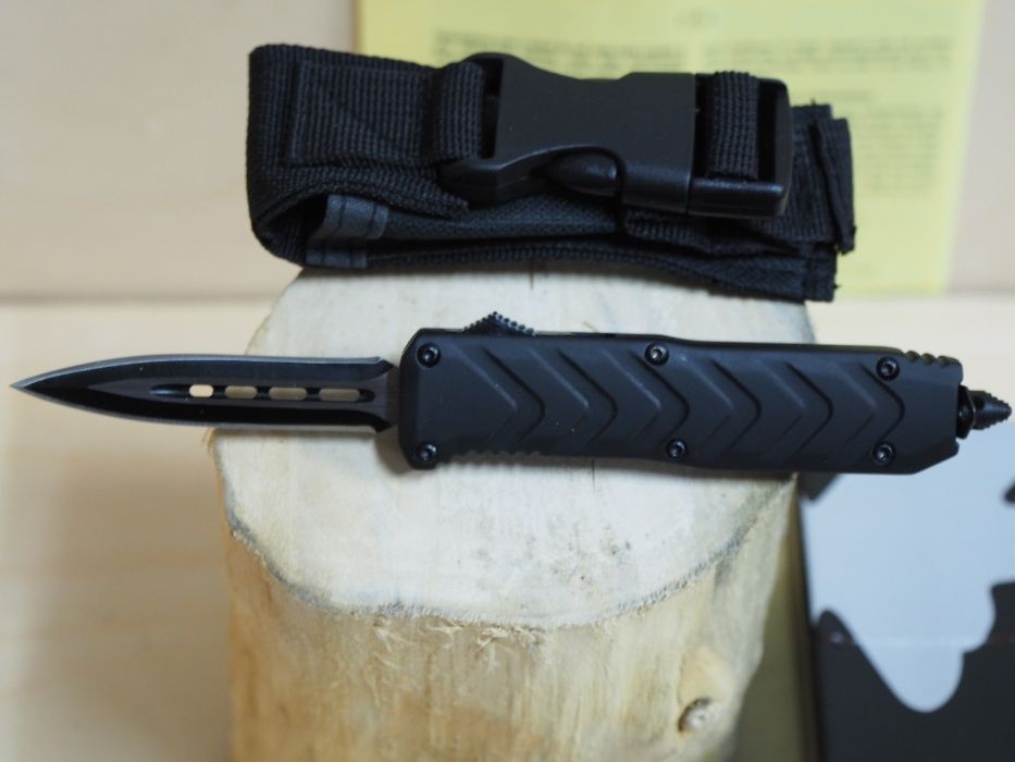 Noz skladany spręzynowy wzor Microtech metalowa rekojeść ostrze