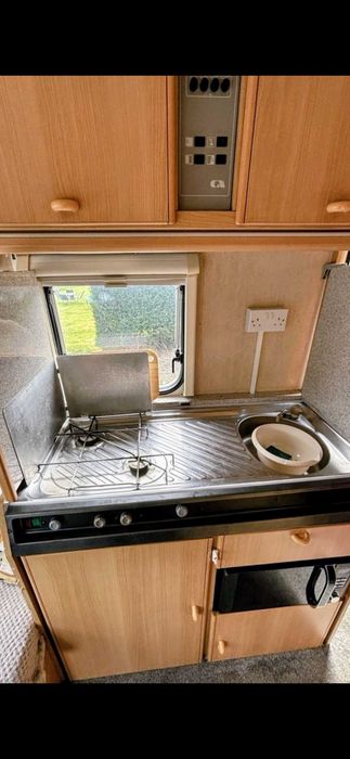 Adria Optima 4 berth caravan ,with full awning .