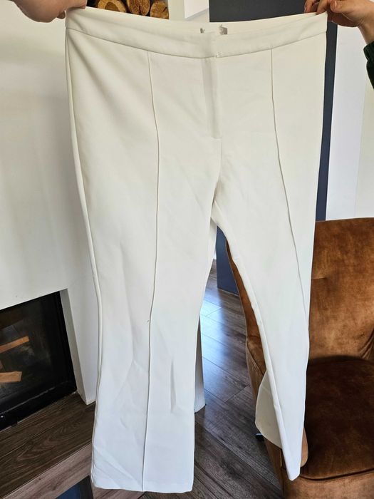 Spodnie biale eleganckie 48