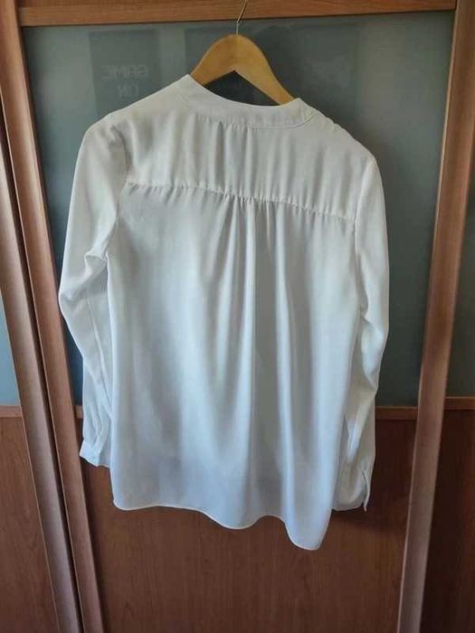 Blusa efeito cruzado com laço S
Nunca cheguei a usar
Shop1One