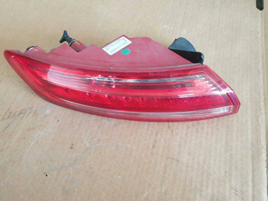 Renault laguna III 3 coupe lewa lampa tył tylna w błotnik
