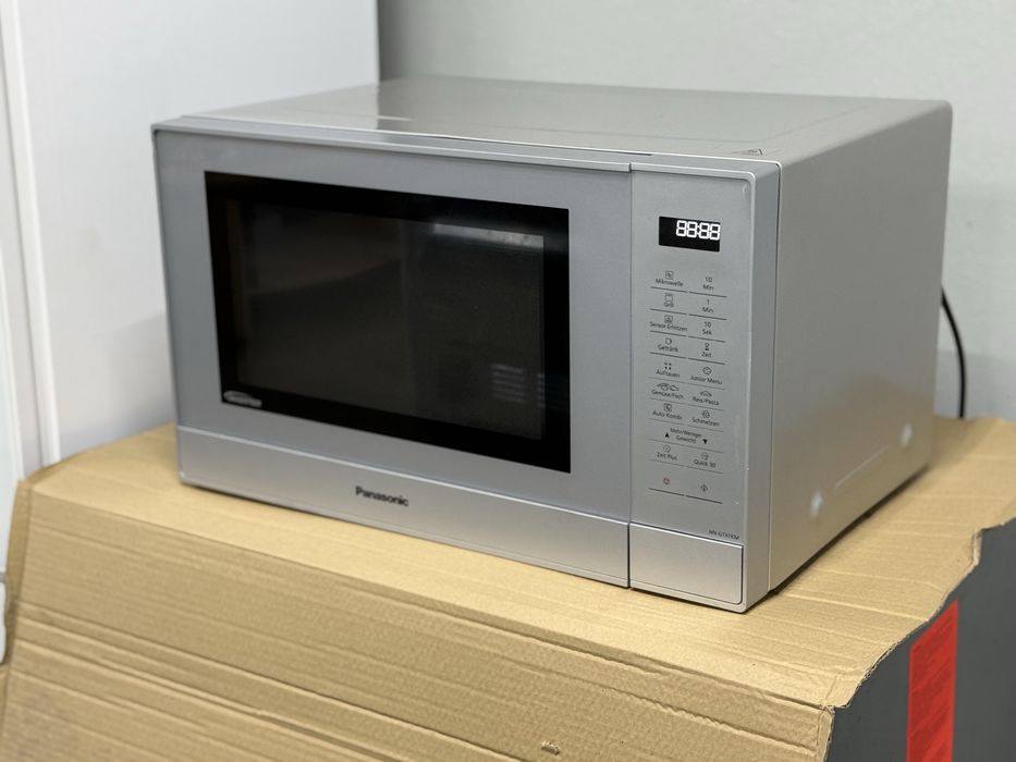Нова Сенсорна мікрохвильова піч Panasonic Привезена з Європи.