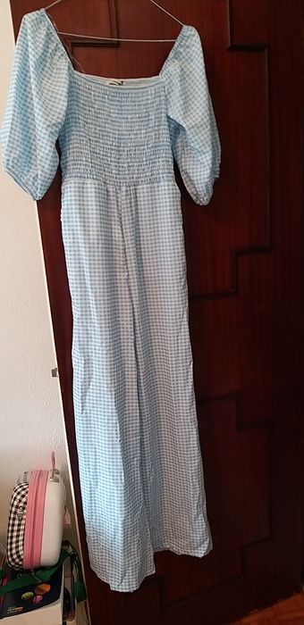 Macacão azul e branco