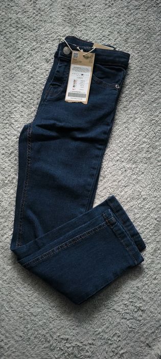 Nowe spodnie jeansowe coccodrillo r. 122