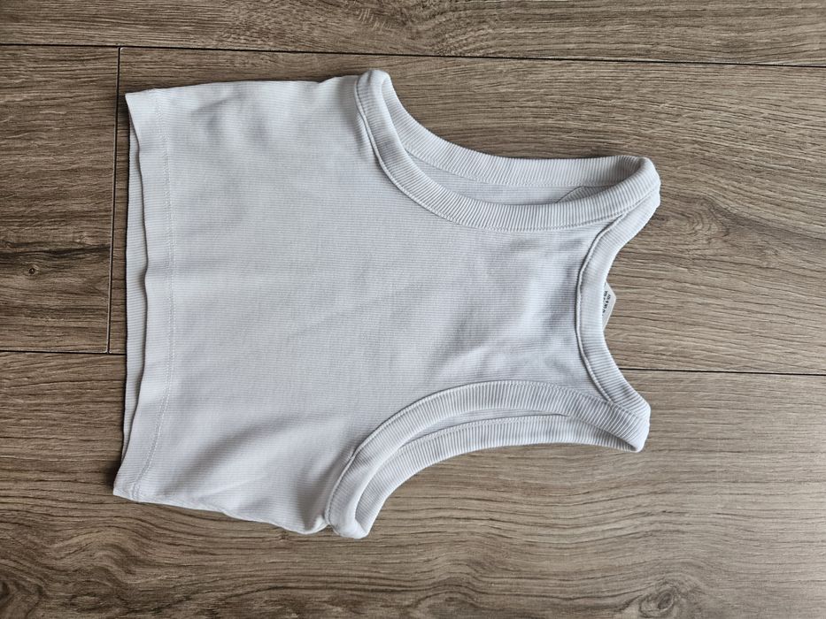 Biały crop top H&M 134/140
Dł całk ok.38cm, szer pod pachami ok