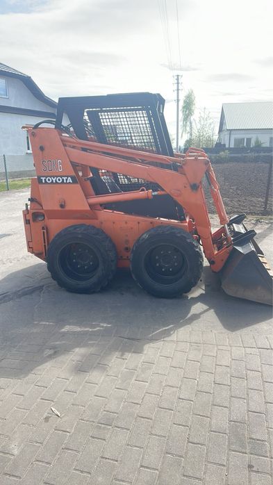 Навантажувач, фронтальний навантажувач, погружчик, бобкат,трактор,