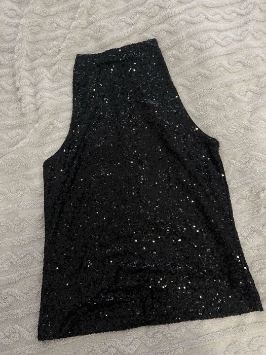 Трендовий топ в паєтки,нереально красиво блистить,розмір L-Xl