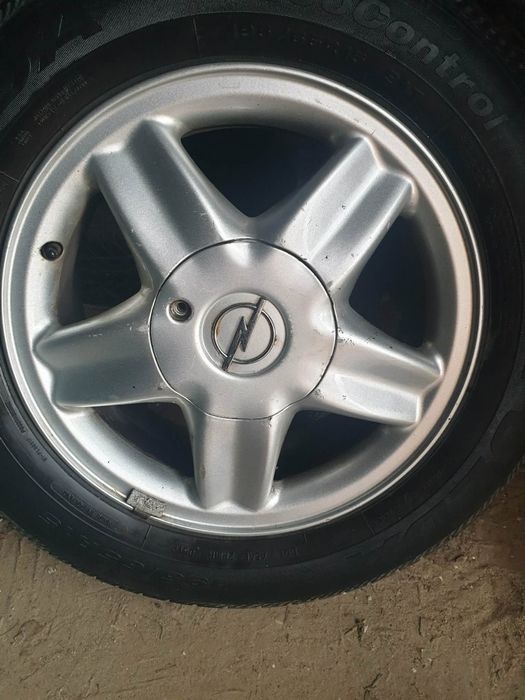 Oryginalne Alufelgi Opel 15 Komplet 4 szt. + Dekielki