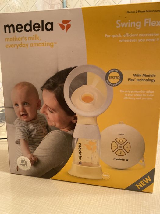 Електронный молокоотсос medela