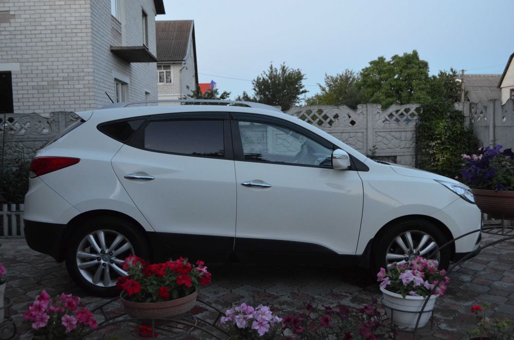 Hyundai ix35 2010 VIN KMHJU81CDBU167650 фото оголошення 8 з 24