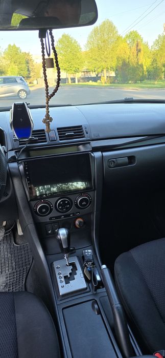 Машина Mazda 3