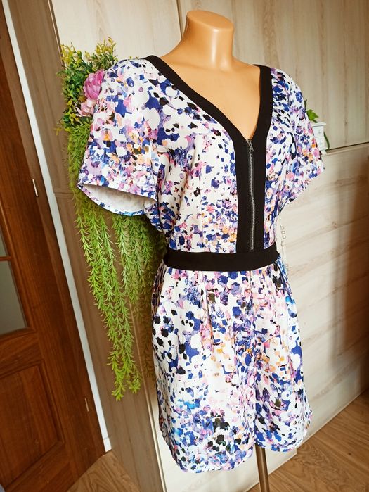 Sg Piękny letni krótki kombinezon damski 42 , XL