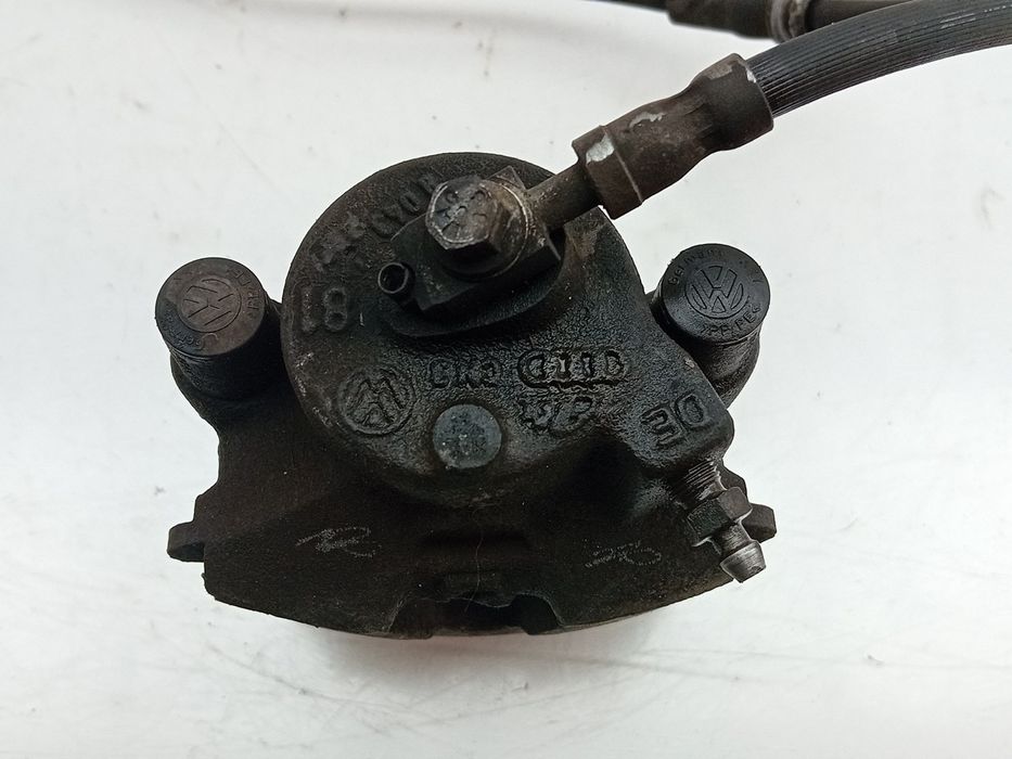 Pinça travão / maxila de travão frente esquerda SEAT Leon (1P1)