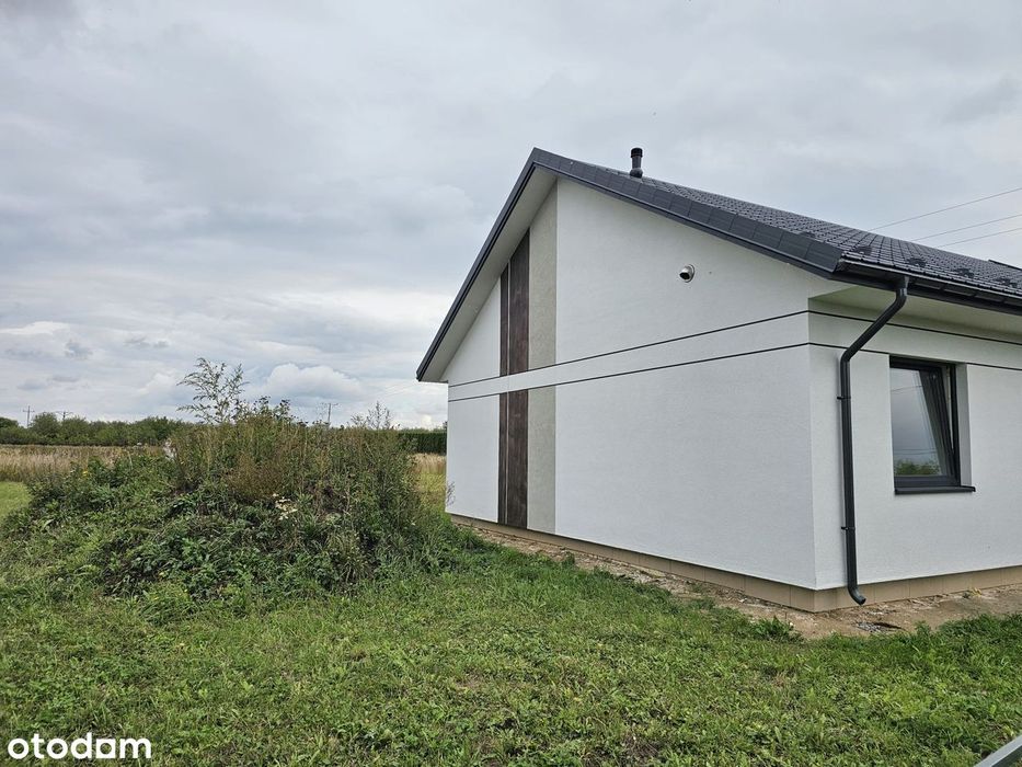 NOWOCZESNY DOM - 91 m² energooszczędnego komfortu bez zbędnych metrów.