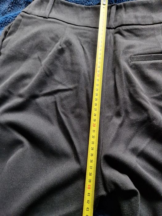 Eleganckie proste spodnie z wysokim stanem L