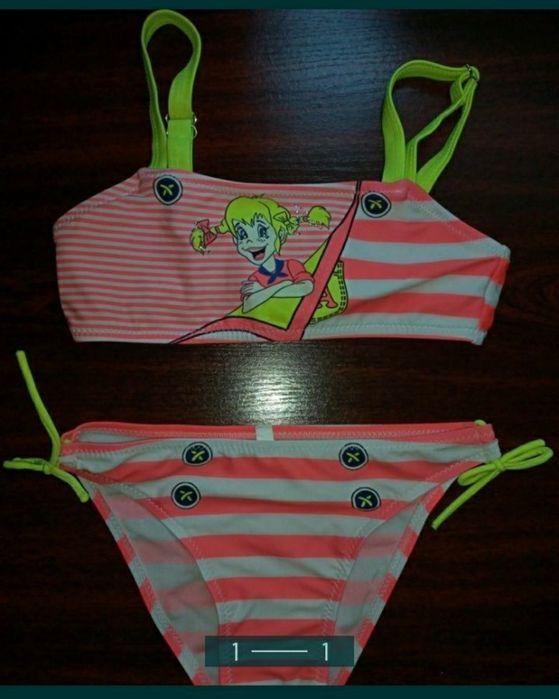 Стильный яркий купальник на:5-7 лет( на рост от:110 см до:122 см.