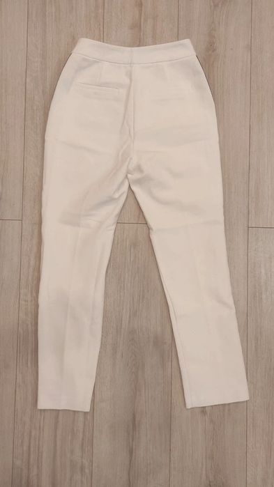 Białe spodnie w kant z lampasem, Reserved, r. 34/XS