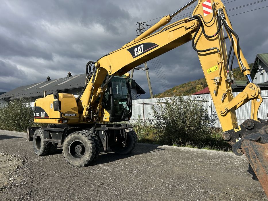 Koparka kołowa Cat 313c