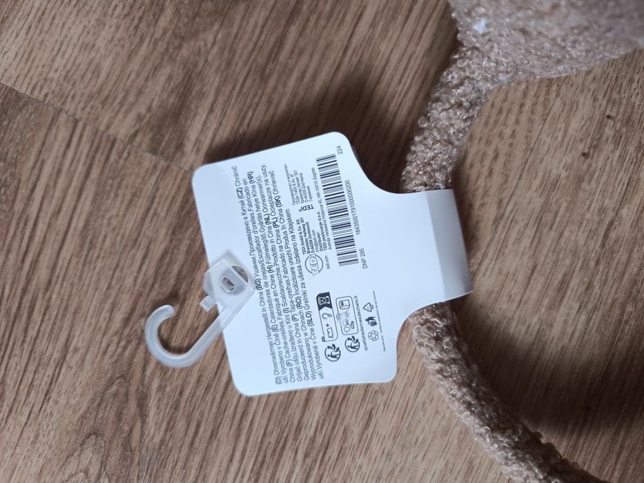 nowe nauszniki beżowe misiowy materiał