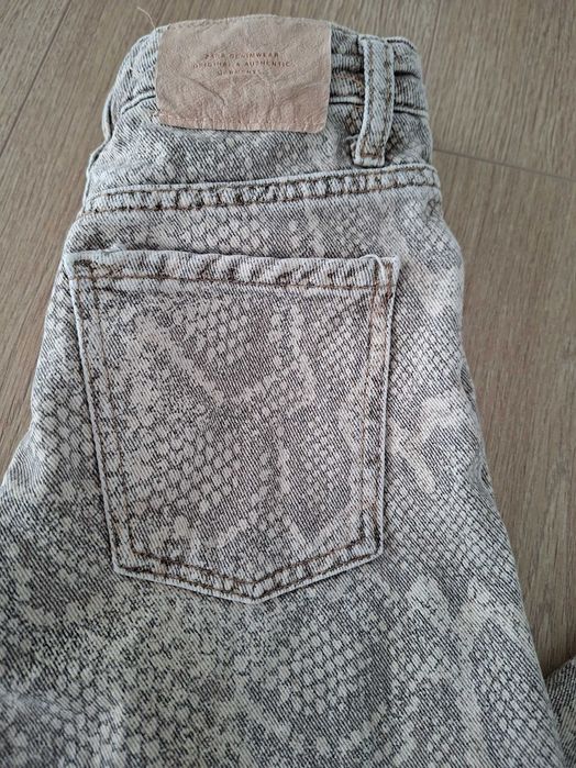 Calça de ganga Zara menina, estampado animal. Tam. 8 anos